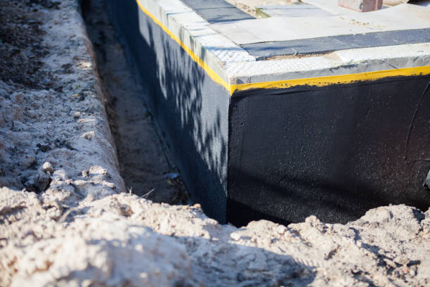 Professional Waterproofing technician working in Paramus, NJ